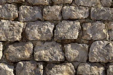 Eski gri antik kaldırım taşı duvarının fotoğrafı. Arkaplan veya haritalama için arkaplan dokusu