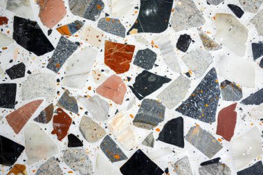 Zemin yüzeyindeki gri terrazzo parçacıklarının fotoğrafı. Arkaplan veya haritalama için arkaplan dokusu