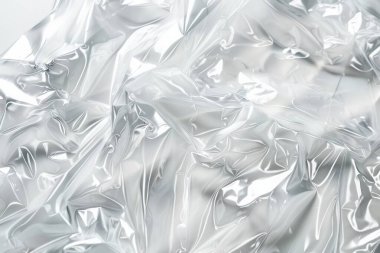 Buruşmuş politen plastik ambalaj kağıdının fotoğrafı. Arkaplan veya haritalama için arkaplan dokusu