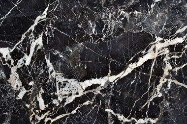 Siyah mutfak mermeri desenli beyaz damarlı bir fotoğraf. Arkaplan veya haritalama için arkaplan dokusu