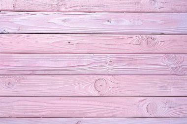 Eski pembe tahta kalıpların fotoğrafı. Arkaplan veya haritalama için arkaplan dokusu