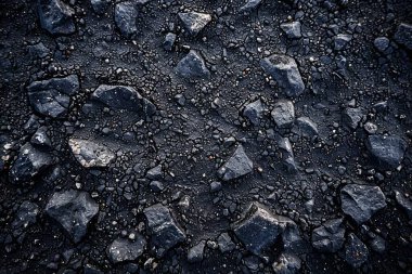 Yakından taşlı asfalt gri yüzey fotoğrafı. Arkaplan veya haritalama için arkaplan dokusu