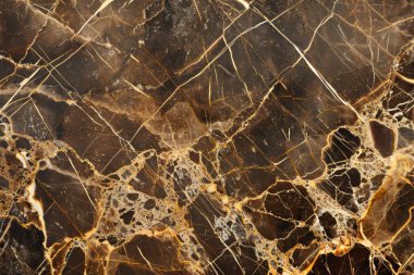 Beyaz damarlı sıcak kahverengi mermer desenli fotoğraf. Arkaplan veya haritalama için arkaplan dokusu