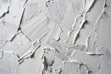 Düz yüzeydeki birçok akrilik yağlı boya lekelerinin fotoğrafı. Arkaplan veya haritalama için arkaplan dokusu