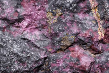 Doğal kaba granit desenli fotoğraf. Yakın çekim. Arkaplan veya haritalama için arkaplan dokusu