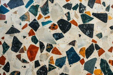 Zemin yüzeyindeki gri terrazzo parçacıklarının fotoğrafı. Arkaplan veya haritalama için arkaplan dokusu