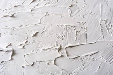 Düz yüzeydeki birçok akrilik yağlı boya lekelerinin fotoğrafı. Arkaplan veya haritalama için arkaplan dokusu