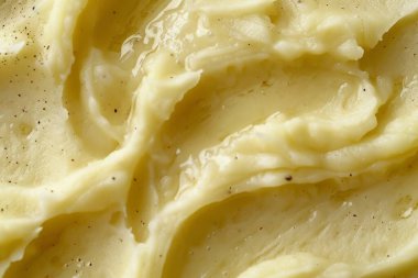 Sarı patates püre desenli fotoğraf yakın çekim. Arkaplan ya da yemek tarifleri için yemek fotoğrafı