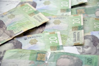 Ukrayna 'nın işlenmiş Hryvnia UAH kolajı banknotların dokusunu destekler. Pankart, arkaplan veya 3B haritalama için doku