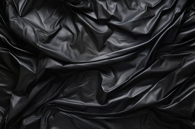 Siyah selofan çöp torbası dokusunun işlenmiş kolajı. Pankart, arkaplan veya 3B haritalama için doku