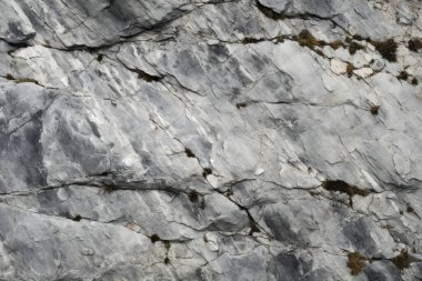 Dağ kayalığı kaya yüzey dokusunun işlenmiş kolajı. Pankart, arkaplan veya 3B haritalama için doku