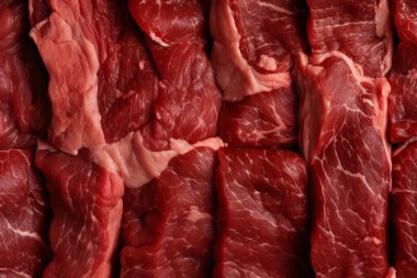 İşlenmiş taze çiğ et yüzey dokusu kolajı. Pankart, arkaplan veya 3B haritalama için doku