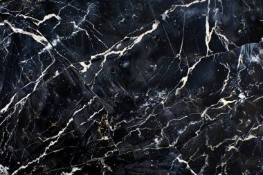 Siyah mutfak mermeri desenli beyaz damarlı bir fotoğraf. Arkaplan veya haritalama için arkaplan dokusu