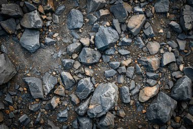 Gri asfalt kaya döküntülerinin fotoğrafı. Arkaplan veya haritalama için arkaplan dokusu