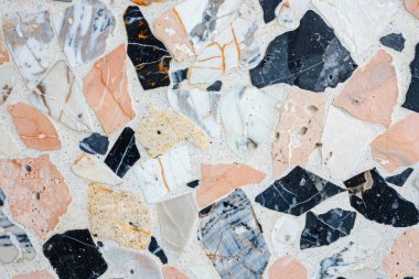 Zemin yüzeyindeki gri terrazzo parçacıklarının fotoğrafı. Arkaplan veya haritalama için arkaplan dokusu