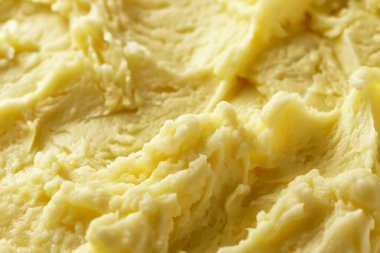 Sarı patates püre desenli fotoğraf yakın çekim. Arkaplan ya da yemek tarifleri için yemek fotoğrafı