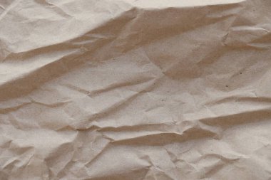 Kahverengi buruşmuş geri dönüşümlü kağıt doku arka planı. Kahverengi buruşmuş geri dönüşümlü karton yaprağın Kraft Kağıt dokusu arka planı