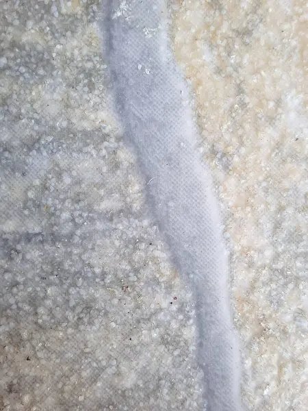 Hafif bir kayma önleyici karonun makro görüntüsü, tanecikli bir kaplama ve ana hat rahatlatıcı, parçanın bir parçası olarak tasarlanmış güvenlik ve kavrama.