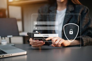 Cyber security concept, Login, User, identification information security and encryption, secure access to user's personal information woman using smart phone and tablet in office