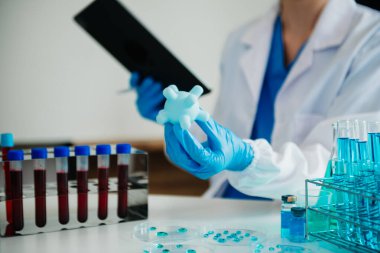 Coronavirus COVID-19 tıbbi test aşısı araştırma ve geliştirme konsepti.. 