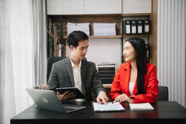  Team work process. Photo young business crew working with new startup project. Project managers meeting. Analyze plans, papers.