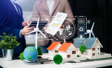 Çalışma teknolojisi ve iş dünyası Net sıfır ve karbon nötr konsepti için el bilgisayarı kullanmayı planlayan iş adamları. NET sıfır simgeleri ve sembolleri eko dünyasını kurtarır ve kirliliği azaltır. yeşil enerji