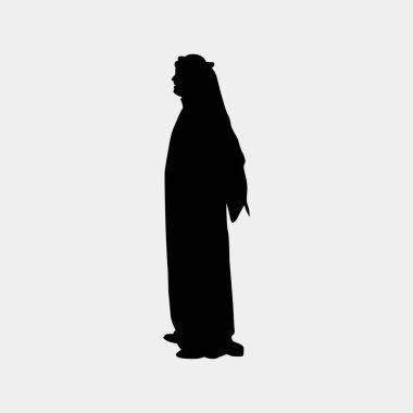 Çarpıcı bir siyah siluet, geleneksel Ortadoğu kılığına girmiş bir adamı gözler önüne seriyor..