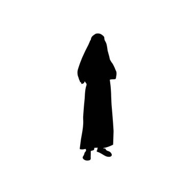 Basit, zarif bir siluet, niqab takan bir kadın, kendine özgü minimalist bir stil sergiliyor..