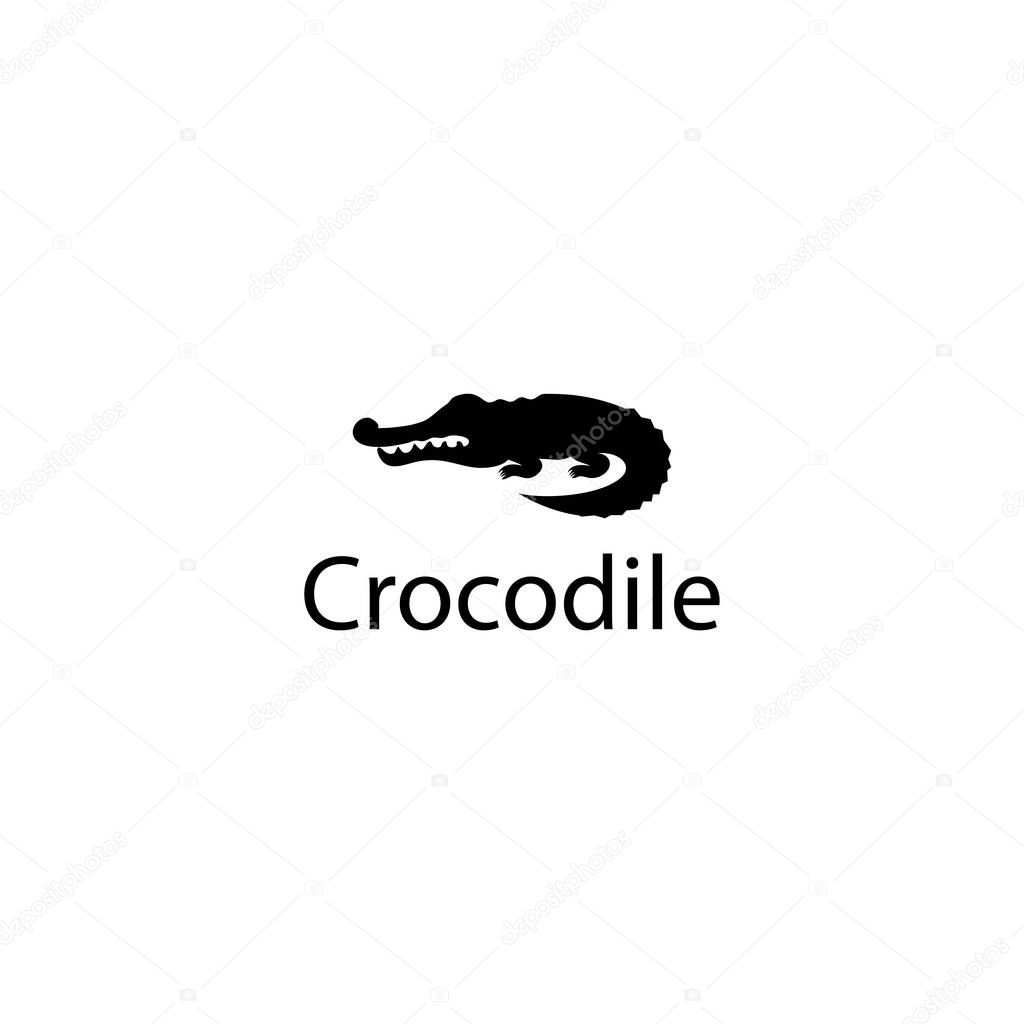 A simple, stylized crocodile silhouette, perfect for logos or branding. The distinctive feature is its minimalist silhouette style.