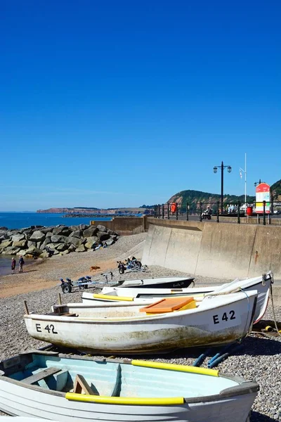 stock image SIDMOUTH, UK - AUGUST 08, 2022 - Boats moored on the beach with views towards the sea and cliffs, Sidmouth, Devon, UK, Europe, August 08, 2022.