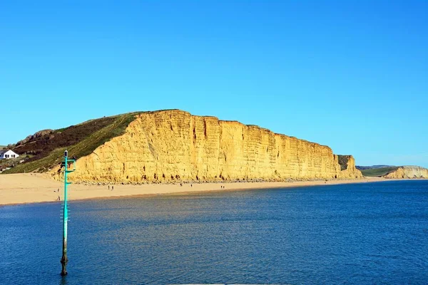 stock image View along the beach and Jurassic Coast coastline, West Bay, Dorset, UK, Europe