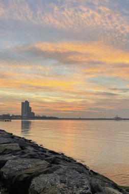 Atakoy,istanbul,Turkey. January 22,2023.Dramatic sky and sunrise in the early morning in Baruthane public park and Marmara sea view in Atakoy district.