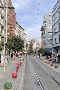 Kadikoy,istanbul,Turkey.January 22,2023.Touristic trip from Kadikoy to Moda by nostalgic tram in istanbul and Bahariye street view with people.