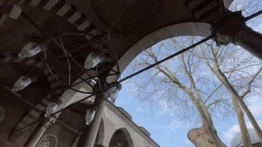 istanbul,Turkey. Februar 18,2023.Historical Eyup Sultan Mosque is located in Eyup district of Istanbul, outside the city walls and near the Golden Horn. Exterior view of Eyup Sultan Mosque, one of the important symbols of Islam.