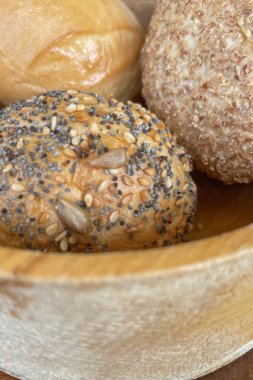 ready to eat roll breads on wooden plate 