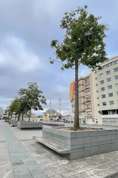 stock image Istanbul,Turkey.June 6th, 2023.Taksim Square.Istanbul's Vibrant Epicenter of Activity. View from Taksim square in the early morning. Taksim mosque, historical and modern buildings.