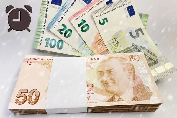 50 Turkish lira banknotes with foreign currency and effects