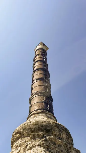 stock image Istanbul Turkey. July 6, 2024. Cemberlitas.The Column of Constantine ,A monumental column commemorating the dedication of Constantinople by Roman emperor Constantine the Great on 11 May 330 AD.