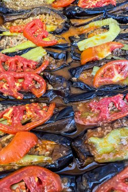 Delicious and Traditional Turkish Cuisine Favorite. Karniyarik - Eggplant Stuffed with Ground Meat and Spices, Bringing the Flavors of Anatolia to Your Table. clipart