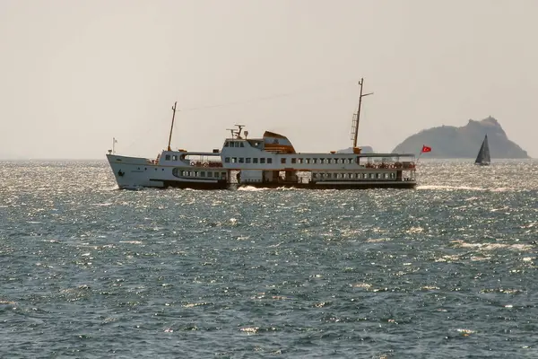 stock image Istanbul,Turkey.August 17,2024.Iconic City Ferry Connecting the European and Asian Sides of Istanbul.Gliding through the blue waters of the Bosphorus, Istanbul's city ferries are the iconic symbols of the maritime connection between Europe and Asia. 