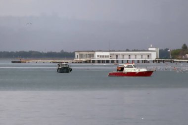 Florya, Istanbul, Turkey. September 1, 2024. Florya beach on a rainy September day with Menekse beach and Florya Ataturk mansion in the background.Istanbul Province. Florya district. clipart