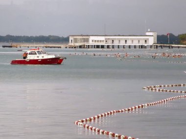 Florya, Istanbul, Turkey. September 1, 2024. Florya beach on a rainy September day with Menekse beach and Florya Ataturk mansion in the background.Istanbul Province. Florya district. clipart