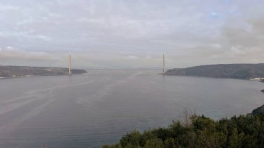 Istanbul, Turkey. 2 ubat 2024. Yavuz Sultan Selim Bridge from Yoros Castle, Istanbul.A stunning view of the Yavuz Sultan Selim Bridge spanning the Bosphorus Strait, captured from the historic Yoros Castle in Beykoz, Istanbul.  clipart