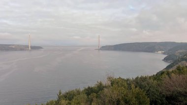 Istanbul, Turkey. 2 ubat 2024. Yavuz Sultan Selim Bridge from Yoros Castle, Istanbul.A stunning view of the Yavuz Sultan Selim Bridge spanning the Bosphorus Strait, captured from the historic Yoros Castle in Beykoz, Istanbul.  clipart