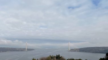 Istanbul, Turkey. 2 ubat 2024. Yavuz Sultan Selim Bridge from Yoros Castle, Istanbul.A stunning view of the Yavuz Sultan Selim Bridge spanning the Bosphorus Strait, captured from the historic Yoros Castle in Beykoz, Istanbul.  clipart