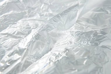 Buruşmuş politen plastik ambalaj kağıdı görüntüsü. Arkaplan kullanımı için doku