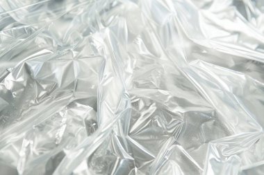 Buruşmuş politen plastik ambalaj kağıdı görüntüsü. Arkaplan kullanımı için doku