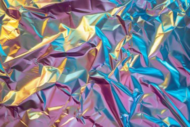 Holografik yanardöner efekt görüntüsü foil materyali yakın çekim. Arkaplan kullanımı için doku