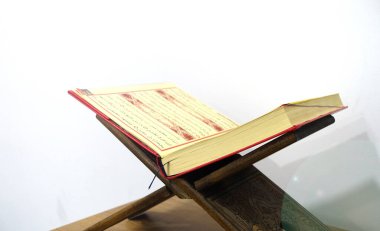 The holy book of Islam, the Holy Quran, on a wooden lectern, the open quran on the lectern, Islam and the Holy Quran,