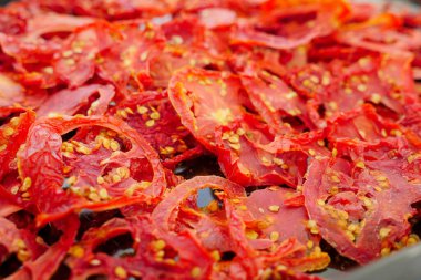 close-up thinly sliced dried tomatoes,thin dried tomato slices,